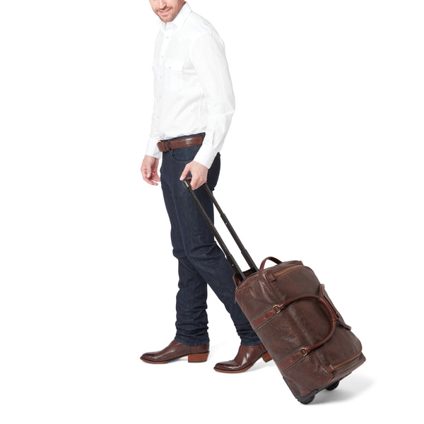 Leather rolling 2024 duffle bag luggage